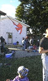 Celebration attendees, adults and children.