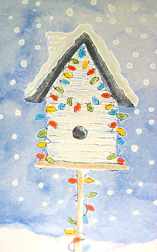 Snowy birdhouse, decorated for Christmas.
