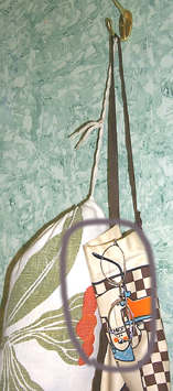 Eyeglasses hanging on Apron