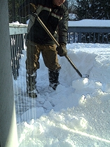 Shoveling off the deck.
