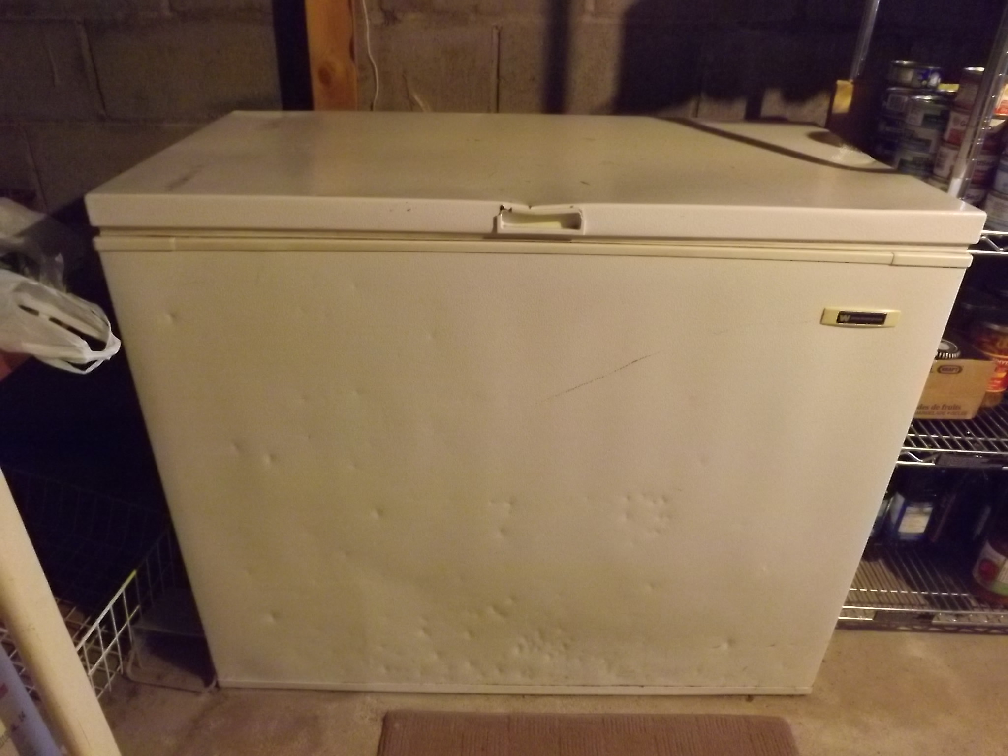 The beat up chest freezer.