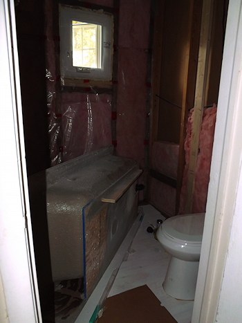 DSCF3260 bathroom floor primer tub