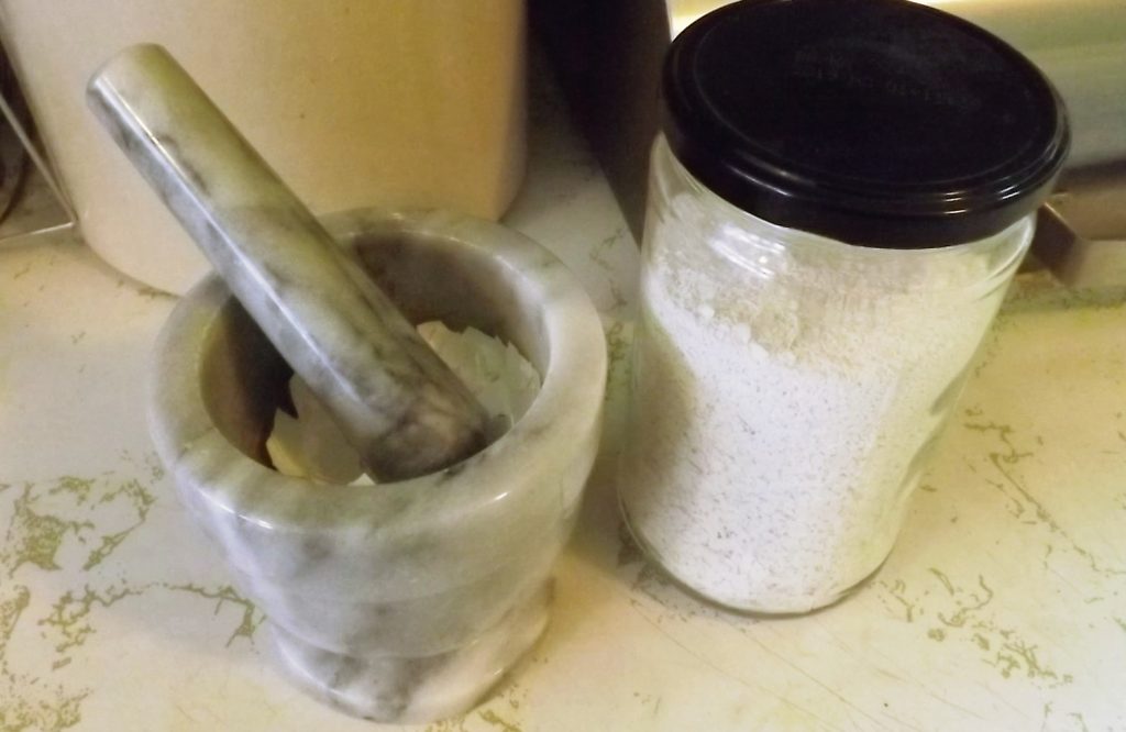 Mortar and pestle, with dired egg shell.